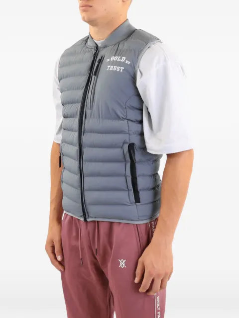 In Gold We Trust The Glory logo-print quilted gilet