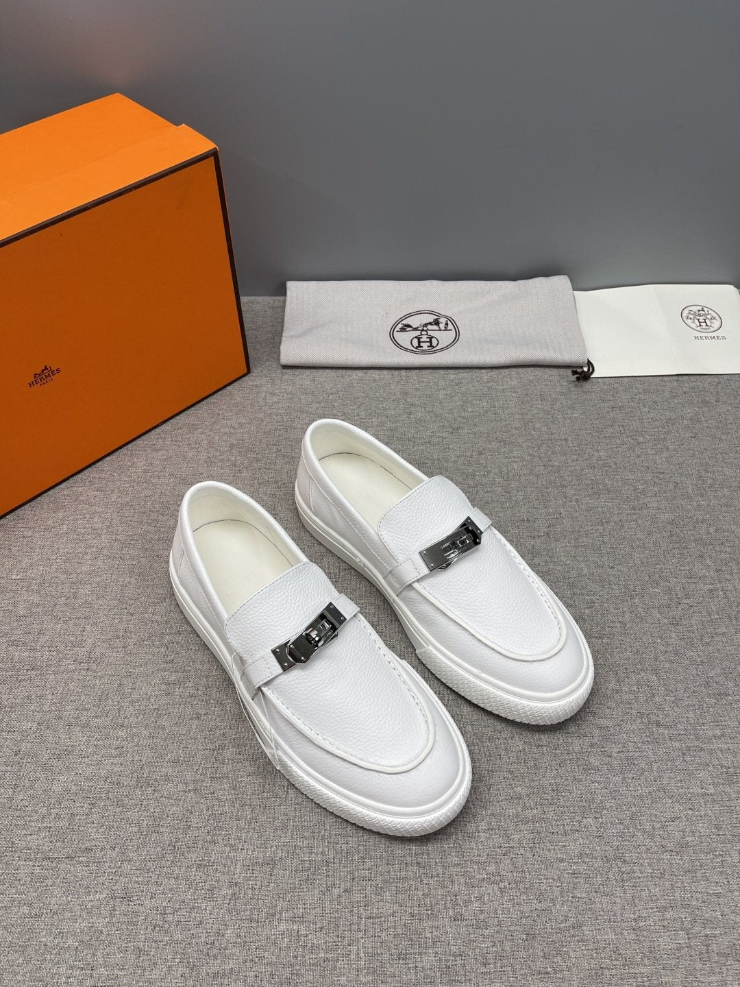 Hermès Textured Bar Loafers